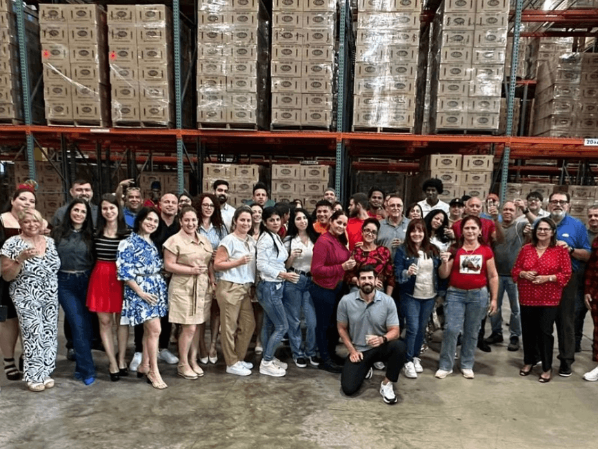 The Chifles team gathered in the Miami warehouse